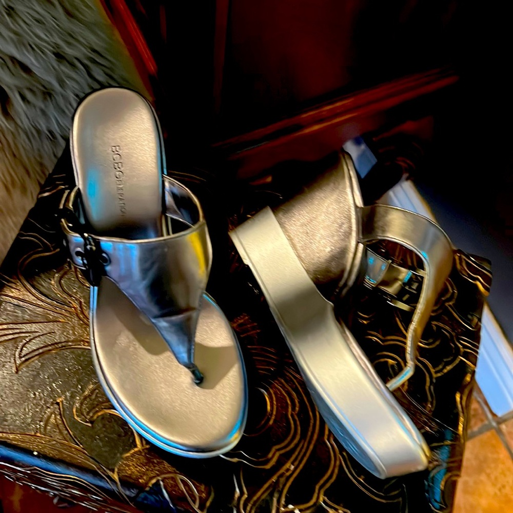 This BCBGeneration Wedge is Silver with a Pewter color combination. 6.5 M - Picture 3 of 7